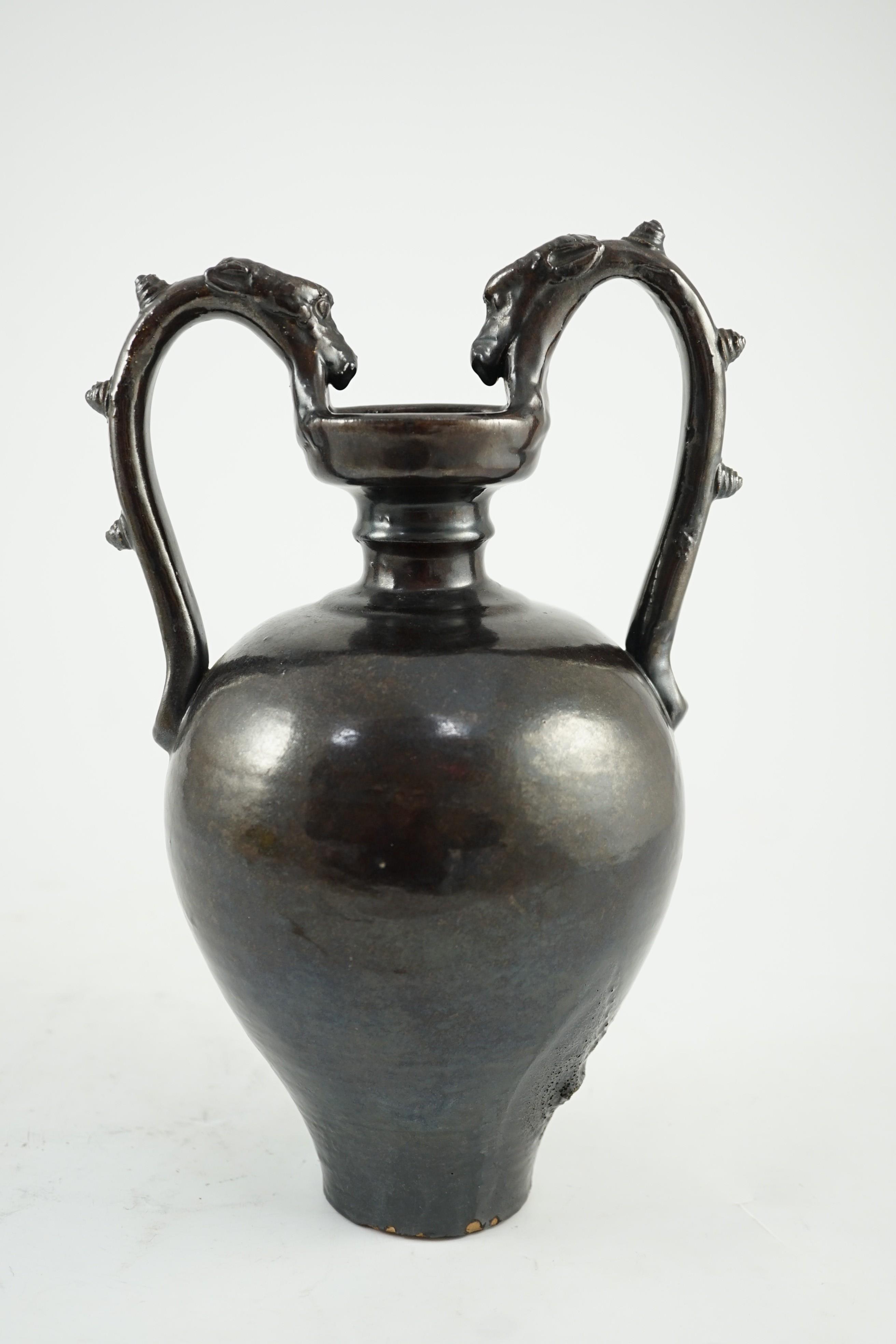 A Chinese dark brown glazed twin handled amphora, in Tang style probably Republic period, 29.5cm high